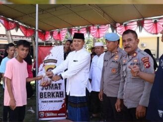 Jumat Berkah Idul Adha 1446 H, Polres Bone Bolango Sembelih 12 Ekor Sapi Qurban dan Bagikan kepada Warga Kurang Mampu