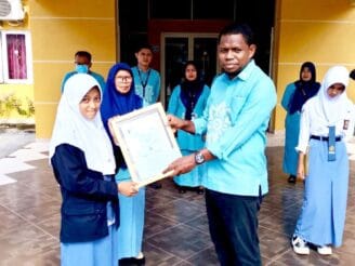 ‎Siswi SMK Bina Mandiri Boalemo Raih Medali Perak Olimpiade Sains dan Bahasa Nasional