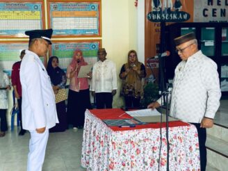 Bupati Sofyan Puhi Resmi Tunjuk Darwis Gani sebagai Penjabat Kepala Desa Hutabohu‎