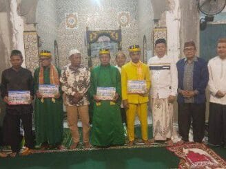 Silaturahmi Ramadhan di Telaga, Pemkab Gorontalo Serahkan Insentif Pemangku Adat
‎