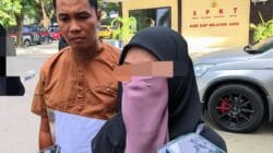 SBS (24) didampingi kuasa hukumnya, Ali Rajab, saat melapor di Polda Gorontalo